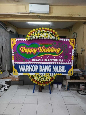 Papan Bunga di Penggilingan
